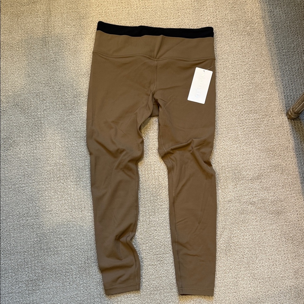 NWT Athleta ultra high rise elation double up tight tan/black leggings. Size L.